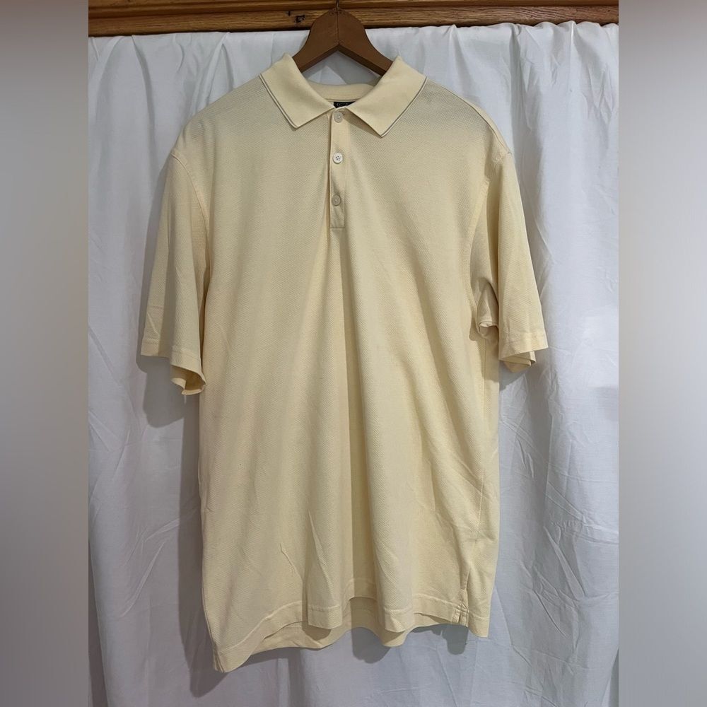 Nike golf, men’s size Large light yellow, short sleeve, polo shirt